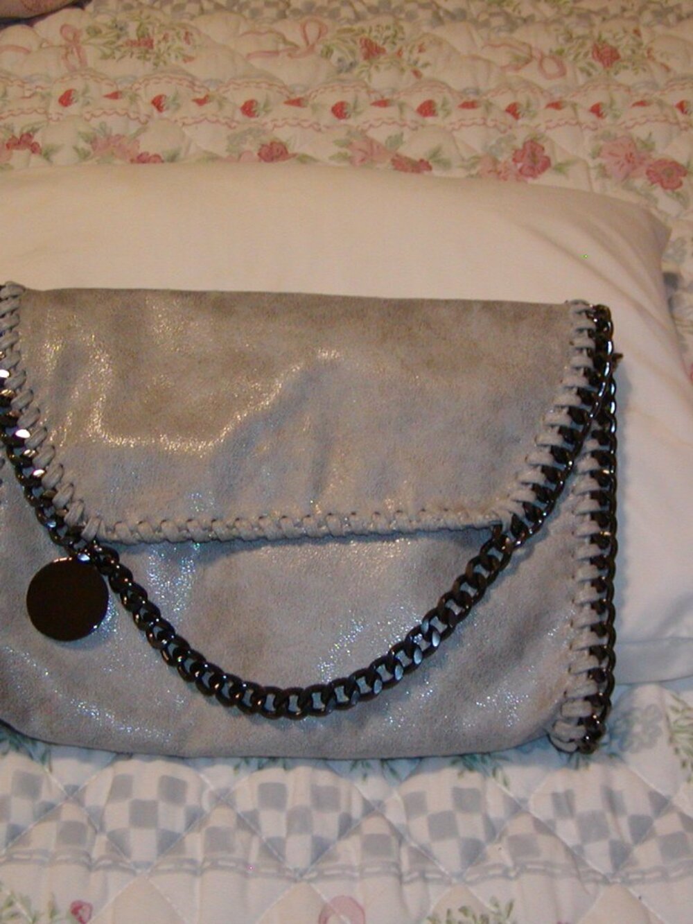 Ladies gray/silver purse.